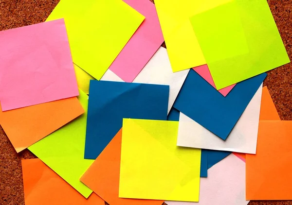 Colurful sticky notes on a cork board — Stock Photo, Image