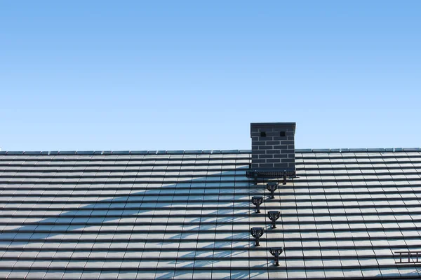 Roof with chimney, modern ceramic tile