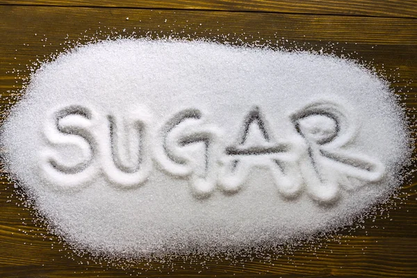 Suiker geschreven op stapel van suiker — Stockfoto