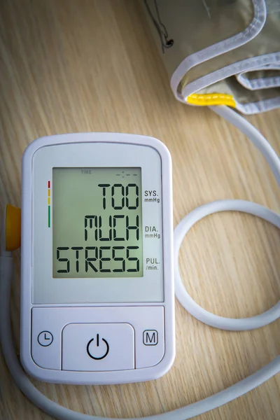 Digital blood pressure monitor with message — Stock Photo, Image