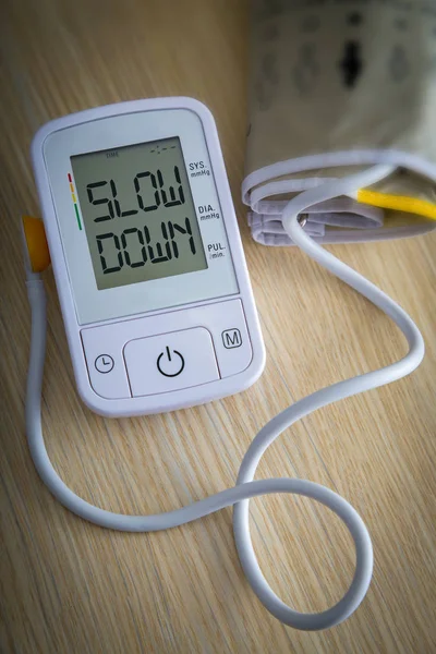 Digital blood pressure monitor with message — Stock Photo, Image