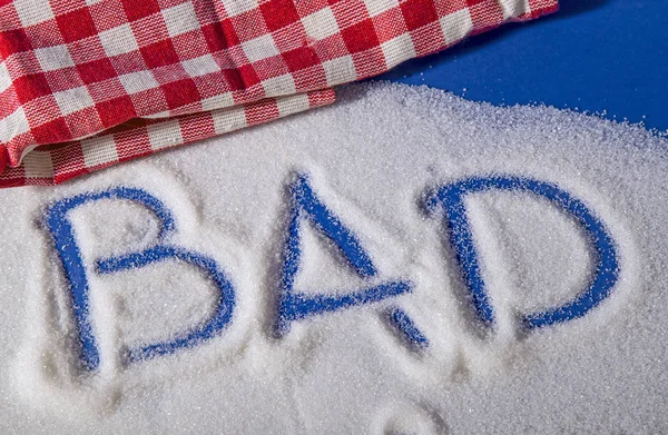 BAD written with sugar — Stock Photo, Image