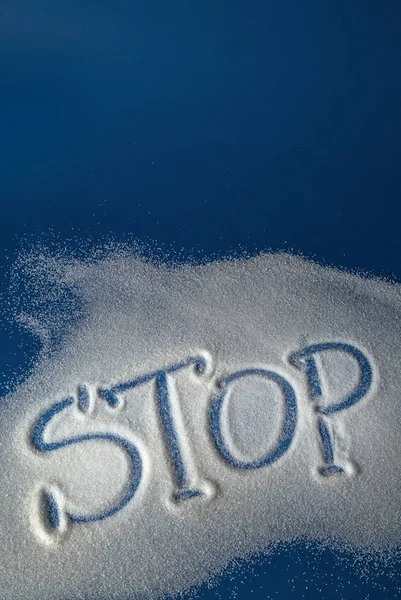 STOP written with sugar — Stock Photo, Image