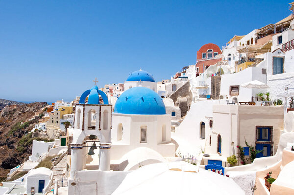 Typical caved architecture during the midday in Fira town on the Santorini (Thira) island in Greece.