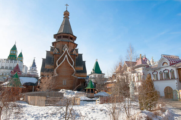 Moscow, Russia-March-23,2018: Inner yard of Izmailovo Kremlin with rich wood carving on walls, windows, stairs.