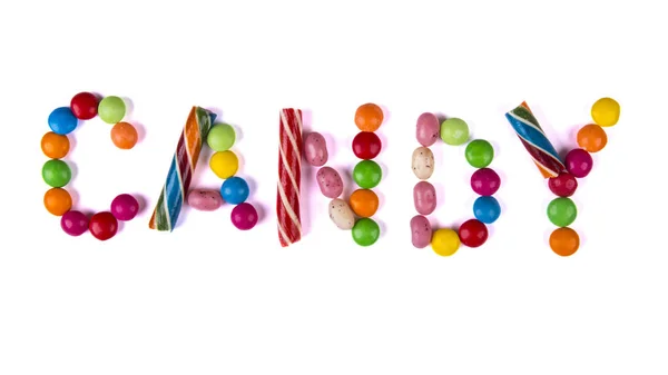 Слово цукерки написано в цукерках — стокове фото