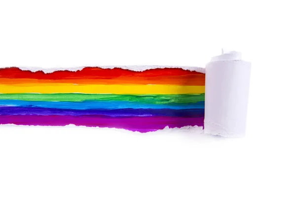 A rainbow line in a torn white piece of paper — Stock Photo, Image