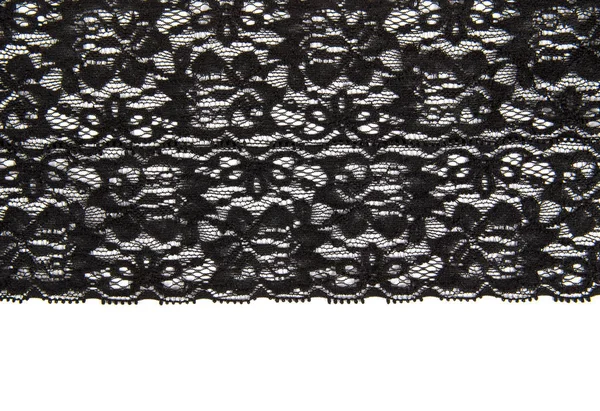 Encaje negro con patrón a la manera de la flor en el fondo blanco —  Fotos de Stock