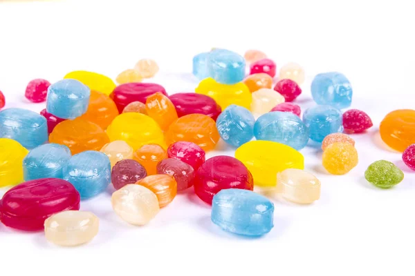 Mixed colorful sweets on white — Stock Photo, Image