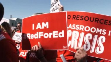 Teachers and students chant 