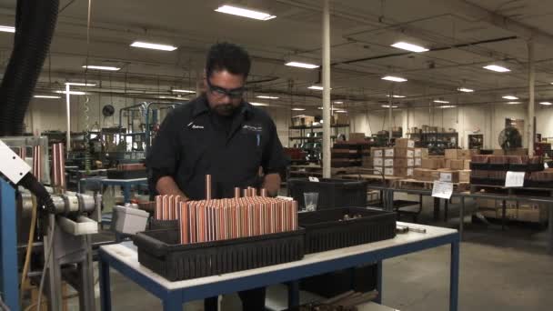 Person Assembly Station Manufactures Copper Parts Warehouse — Stock Video