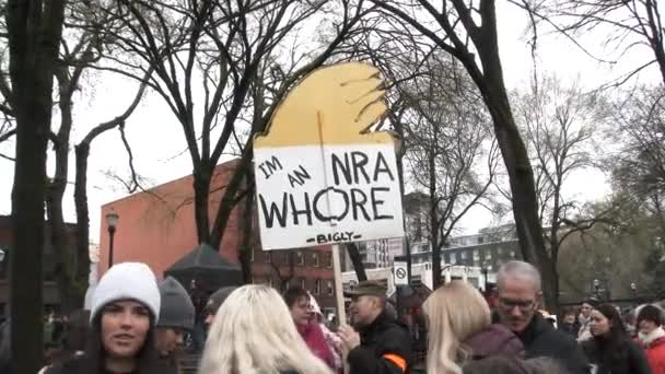 Person Holds Sign Reading Nra Whore Bigly Poking Fun Donald — 图库视频影像