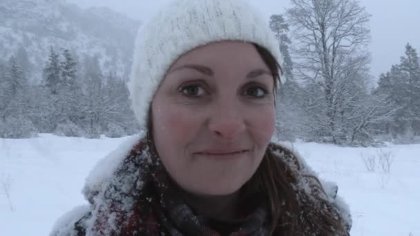 Model Released Woman Looking Lens Smiling While Enjoying Snow Storm — Stock Video