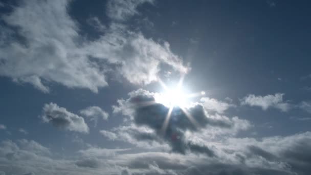 Wide Angle Cloudy Blue Sky Revealing Sun Burst — Stock Video