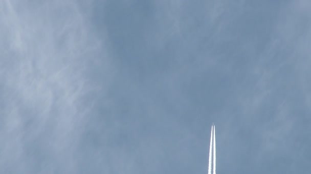 Airplane Flies Overhead Frame Lightly Cloudy Blue Sky Day Leaving — Stock Video