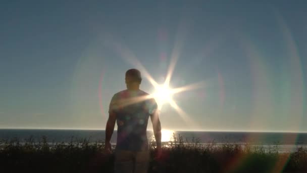 Black Transition Model Released Man Walking Out Looking Pacific Ocean — Stock Video