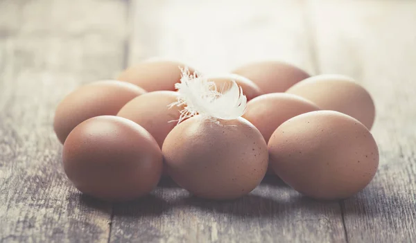 Eggs on wooden background — Stock Photo, Image