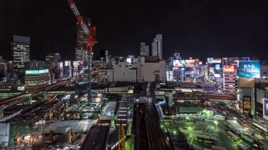 TOKYO, JAPAN - CIRCA MARCH, 2017: Shibuya at night aerial view. Shibuya is known as one of the fashion centers of Japan, particularly for young people, and as a major nightlife area.  clipart
