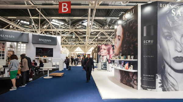 BOLOGNA, ITALY - MARCH 16, 2018: People visit Cosmoprof exhibition, the largest beauty and cosmetic sector trade show in Italy.