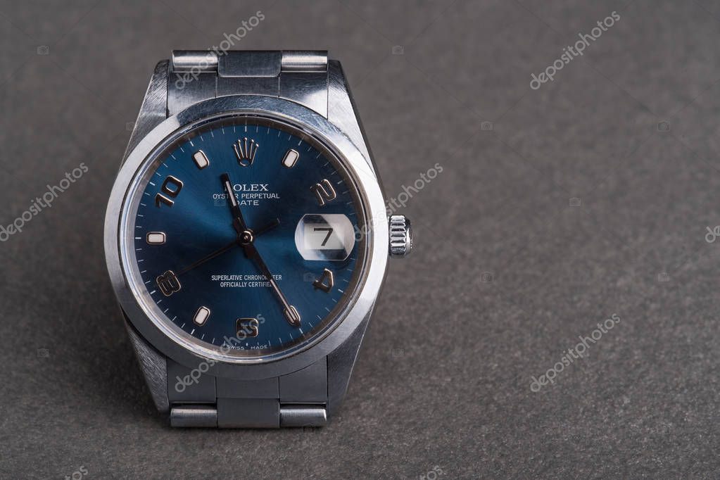 BOLOGNA, ITALY - MARCH 5, 2018: Rolex Oyster Perpetual Date watch. Rolex SA is a Swiss luxury watchmaker, founded by Hans Wilsdorf and Alfred Davis in London, England in 1905. Illustrative editorial.