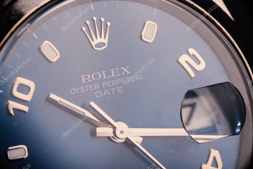 BOLOGNA, ITALY - MARCH 5, 2018: Rolex Oyster Perpetual Date watch. Rolex SA is a Swiss luxury watchmaker, founded by Hans Wilsdorf and Alfred Davis in London, England in 1905. Illustrative editorial.