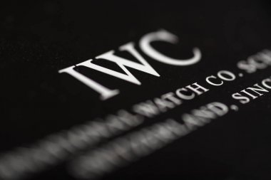 Bologna, İtalya - 8 Mart 2018: Uluslararası izle co logosunu görmeniz gerekir. IWC İsviçre saat üreticisi Schaffhausen, İsviçre'de bulunan bir lüks olduğunu. Sığ derinlik-in tarla. Açıklayıcı yazı işleri.