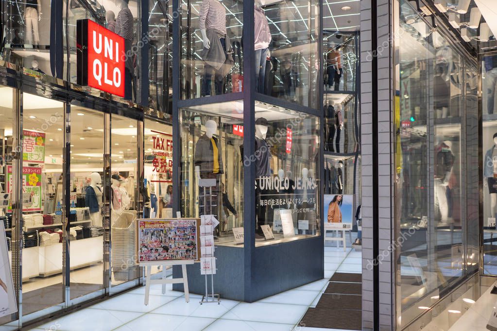 TOKYO, JAPAN - CIRCA MARCH, 2017: UNIQLO store window. Uniqlo Co., Ltd. is a Japanese casual wear designer, manufacturer and retailer.