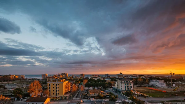 Panoramic image of dramatic sky at sunshine with clouds over Adriatic sea in Misano, Italy.