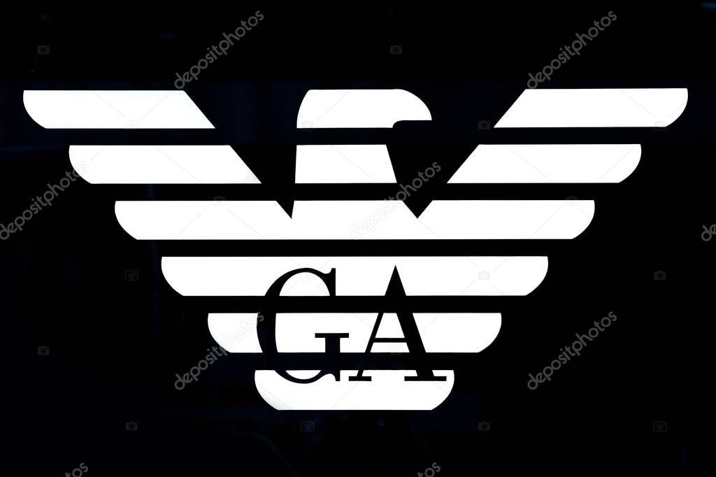 HONG KONG, CHINA - NOVEMBER 21, 2015: Giorgio Armani store logo in the street. Armani is an international fashion house, founded in 1975 by Giorgio Armani.