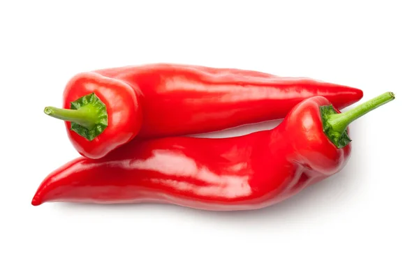 Κόκκινες πιπεριές απομονωμένες σε λευκό φόντο — Φωτογραφία Αρχείου