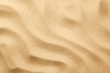 Natural sea sand for summer backgrounds. Top view. Flat lay clipart
