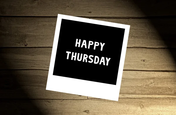 Happy Thursday note on brown wooden wall — Stock Photo, Image