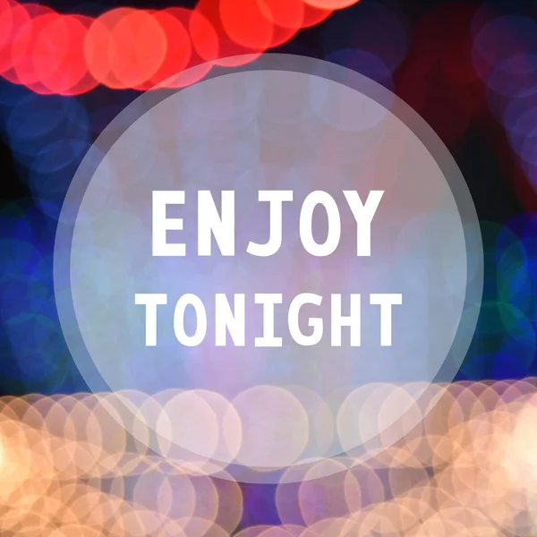 Enjoy tonight on colorful bokeh background — Stock Photo, Image