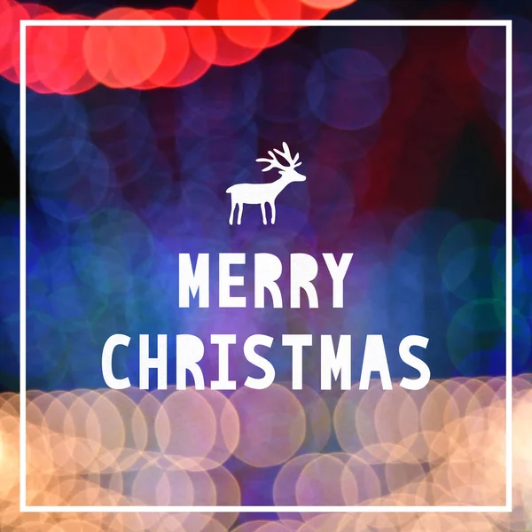Feliz Navidad con renos sobre fondo bokeh colorido — Foto de Stock