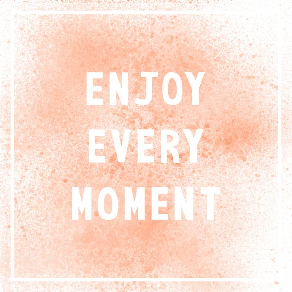 Enjoy every moment on orange paint background — Stock Photo, Image