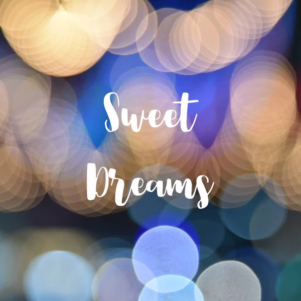 Dulces sueños texto sobre fondo bokeh colorido —  Fotos de Stock