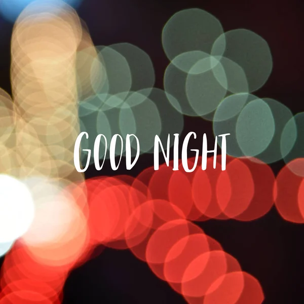 Good night text on colorful bokeh background