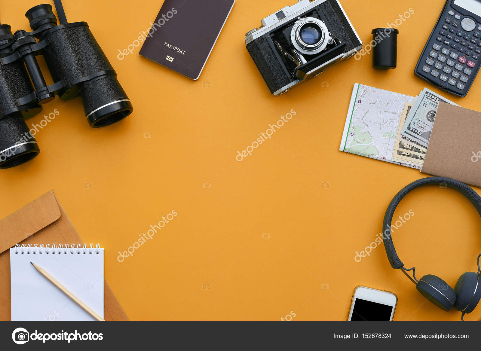 Accessories On Orange Desk Background Of Photographer