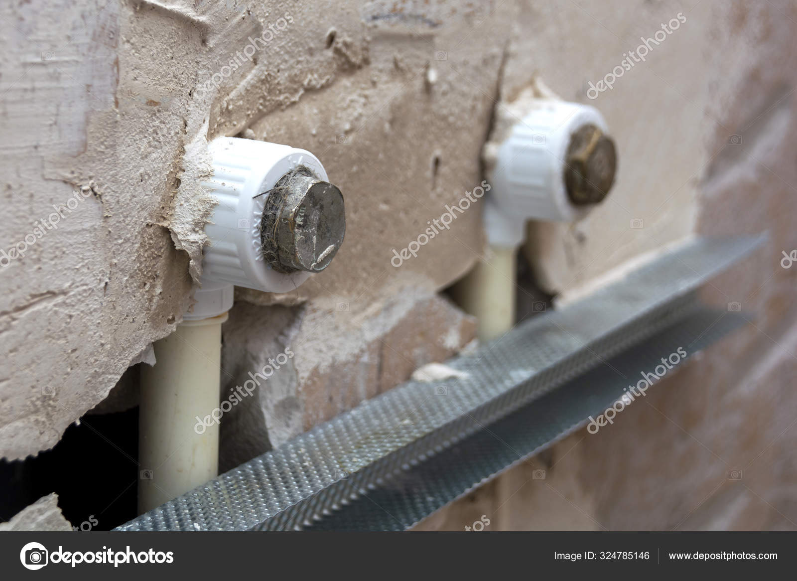 Installation of plastic pipes inside the wall. Bathroom repair. — Stock Photo © dipnik 324785146