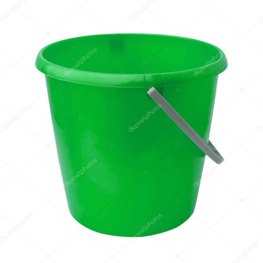 New, classic, plastic bucket. Green bucket isolated on a white background.