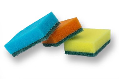 Many colorful sponges for washing dishes. Hygienic sponge isolated on a white background.