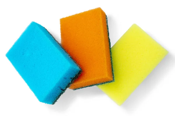 Três esponjas brilhantes coloridas para lição de casa. Conjunto de flores amarelas, azuis e laranja. Separar em um fundo branco . — Fotografia de Stock