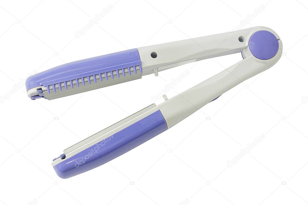 Hair iron Isolated on a white background with copy space.