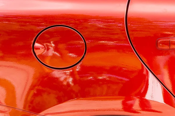 Detail fragmentu červeného auta — Stock fotografie