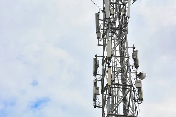 Cellular tower with antennas for connecting people by means of telephony and internet. Telecommunication equipment on tower.Close-up.