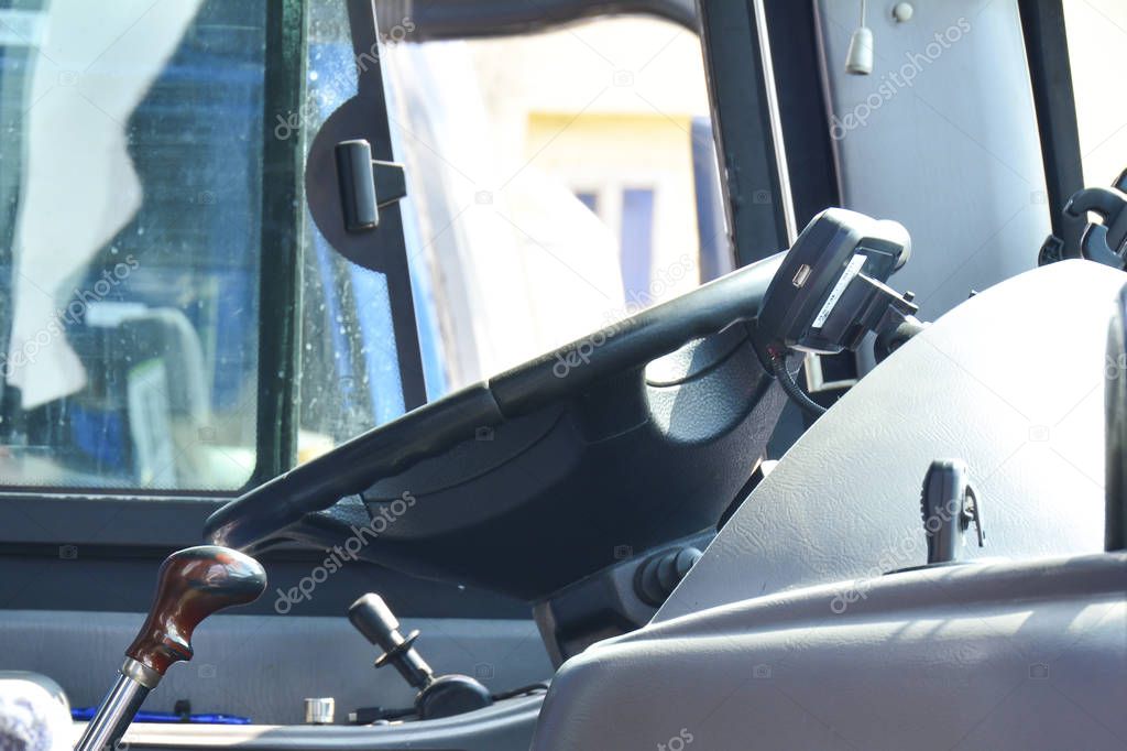 View professional driver's cab. In the modern bus. The concept of lack of workers, strike, lack of staff, driving rest.