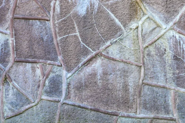 Fondo de pared de piedra. La textura de la pared de piedras grandes de varias formas y tamaños . —  Fotos de Stock