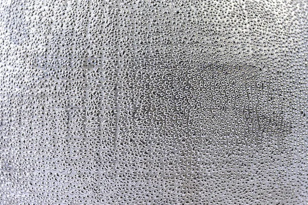 Сірий абстрактний фон. Абстрактні краплі на сірій текстурованій спині — стокове фото