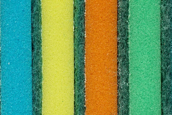 Schwämme zum Waschen. Nahaufnahme. farbenfroher Hintergrund. — Stockfoto