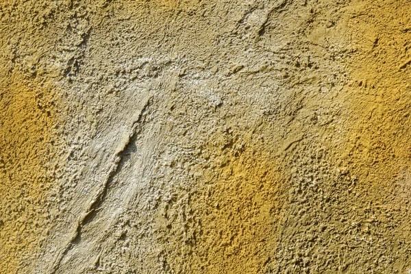 Gelb-graue Zementwand. abstrakte dekorative Stuck Hintergrund. — Stockfoto